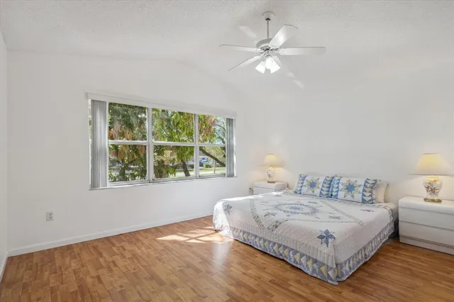 a bathroom with a bathtub sink and mirror