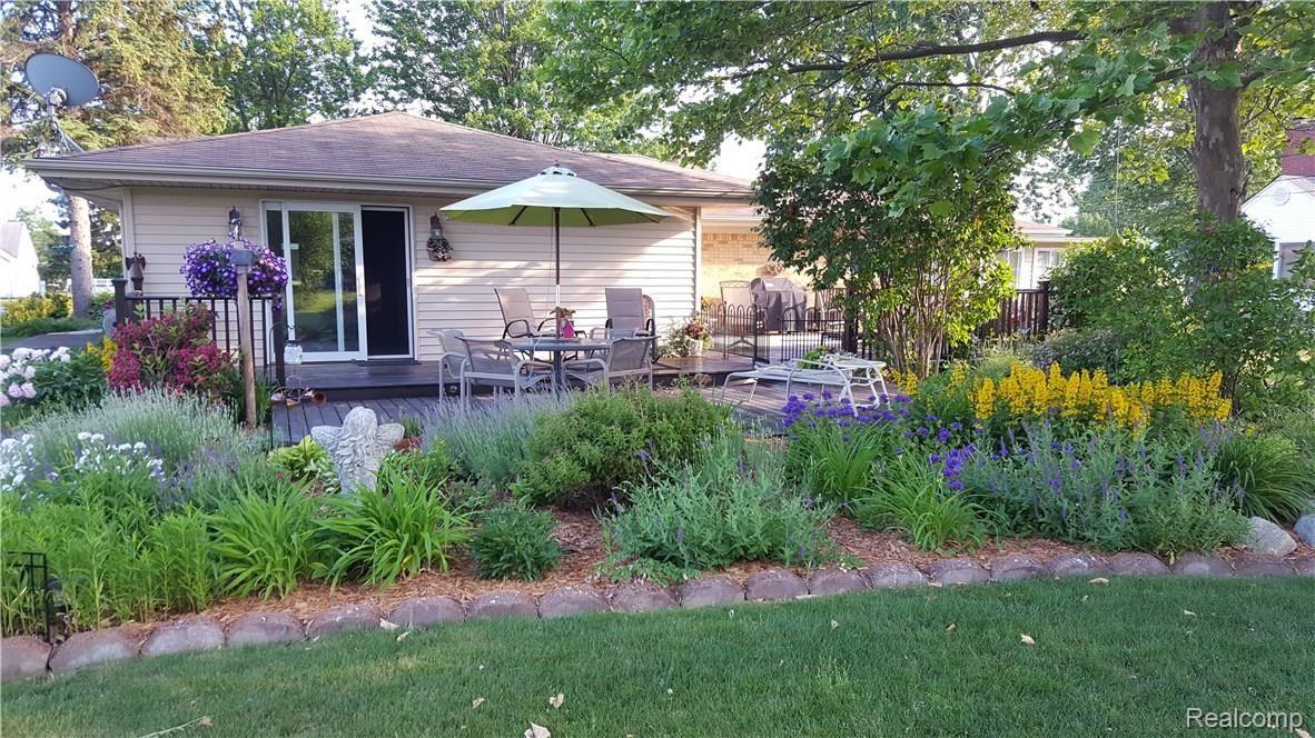 4068 Yankee Road St. Clair, MI 48079 - Photo 8 of 53 BACK DECK IN FULL EARLY SUMMER BLOOM