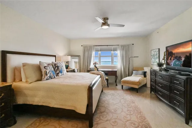 a bedroom with a bed and furniture