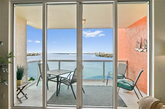 a balcony with chairs