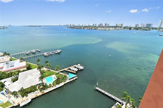 a view of a lake with houses