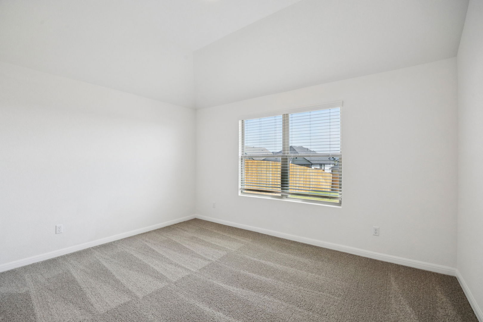 332 Bendecido Loop Elgin, TX 78621 - Photo 23 of 39 an empty room with a window