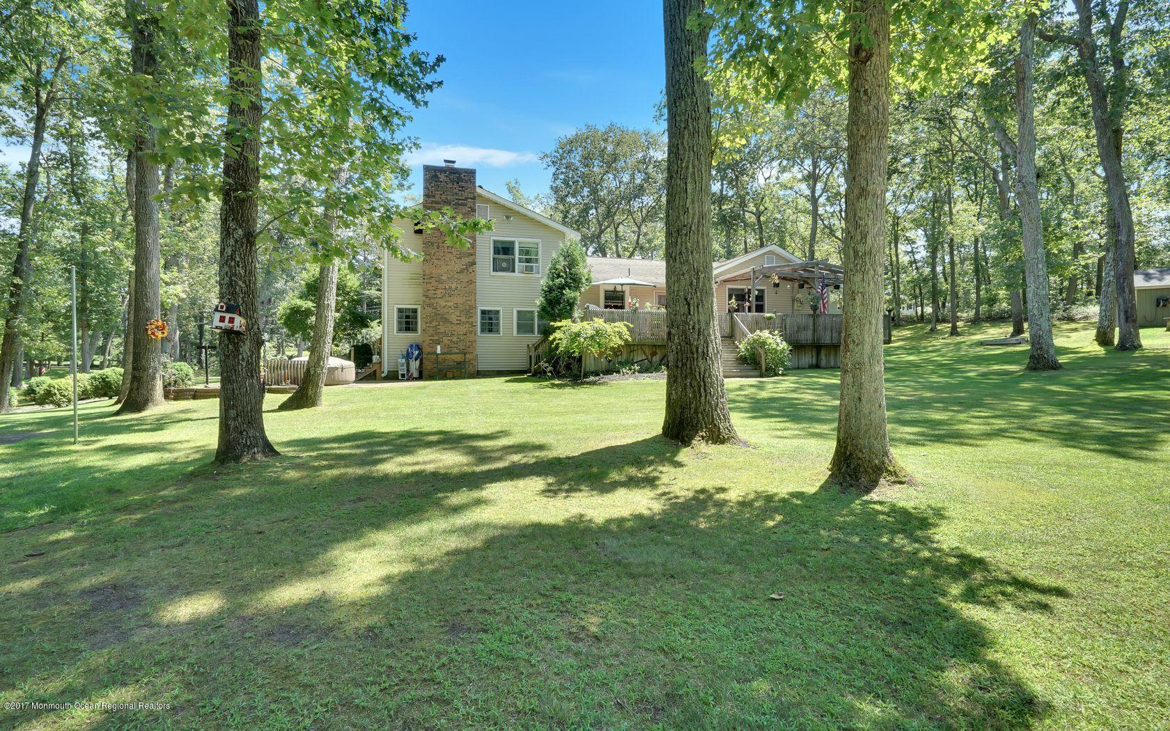 340 Jackson Pines Road Jackson, NJ 08527 - Photo 29 of 41 a view of a house with a yard