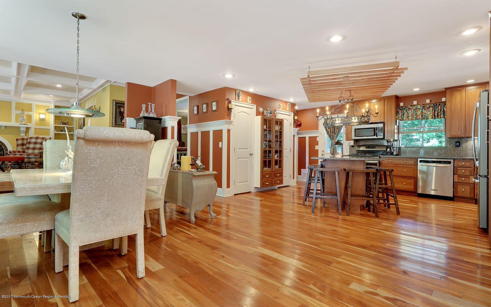 340 Jackson Pines Road Jackson, NJ 08527 - Photo 3 of 41 a living room with lots of furniture wooden floor and large windows