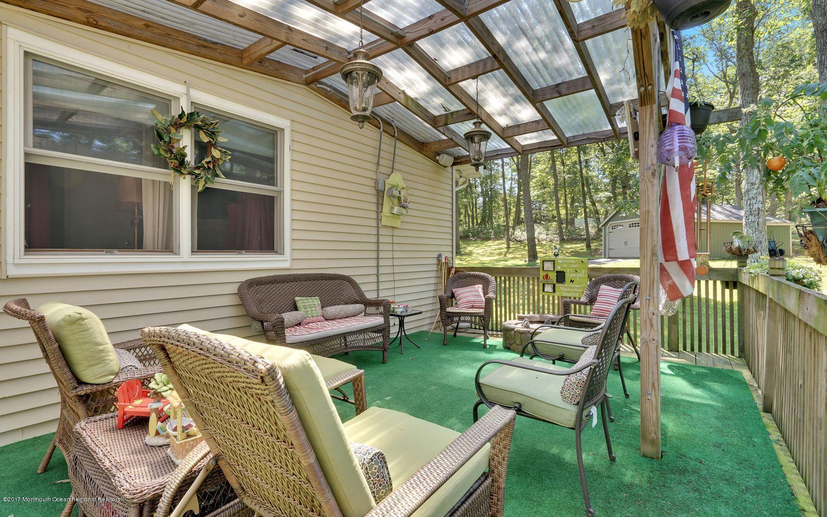 340 Jackson Pines Road Jackson, NJ 08527 - Photo 32 of 41 a view of a patio with couple of chairs