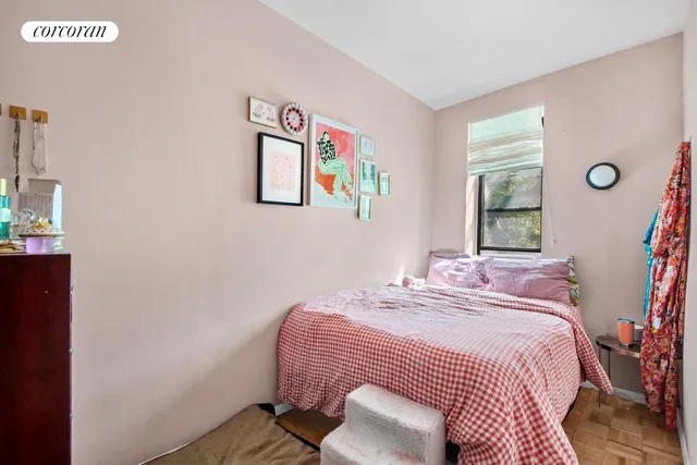 a white kitchen with a table and chairs