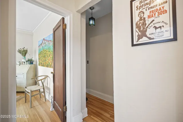 a bedroom with a bed and a table