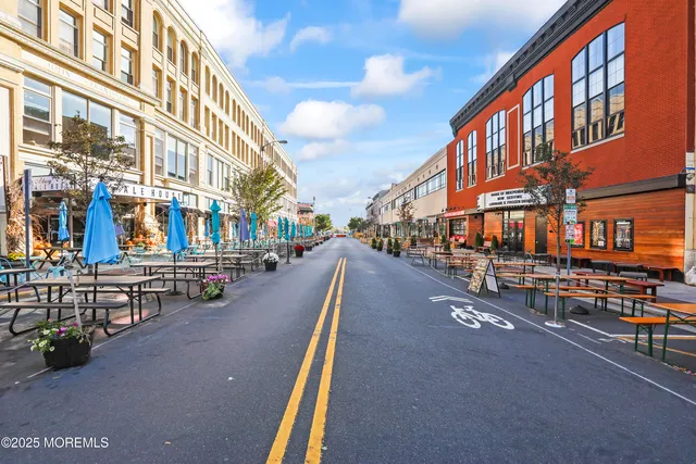 a view of a big house with a big yard