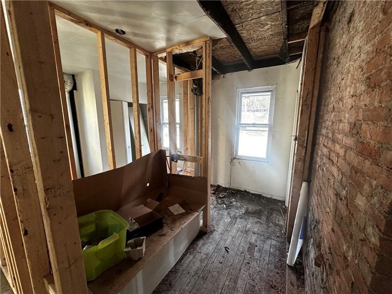 357 Baldwin Road Pittsburgh, PA 15207 - Photo 18 of 25 a living room with furniture and a window
