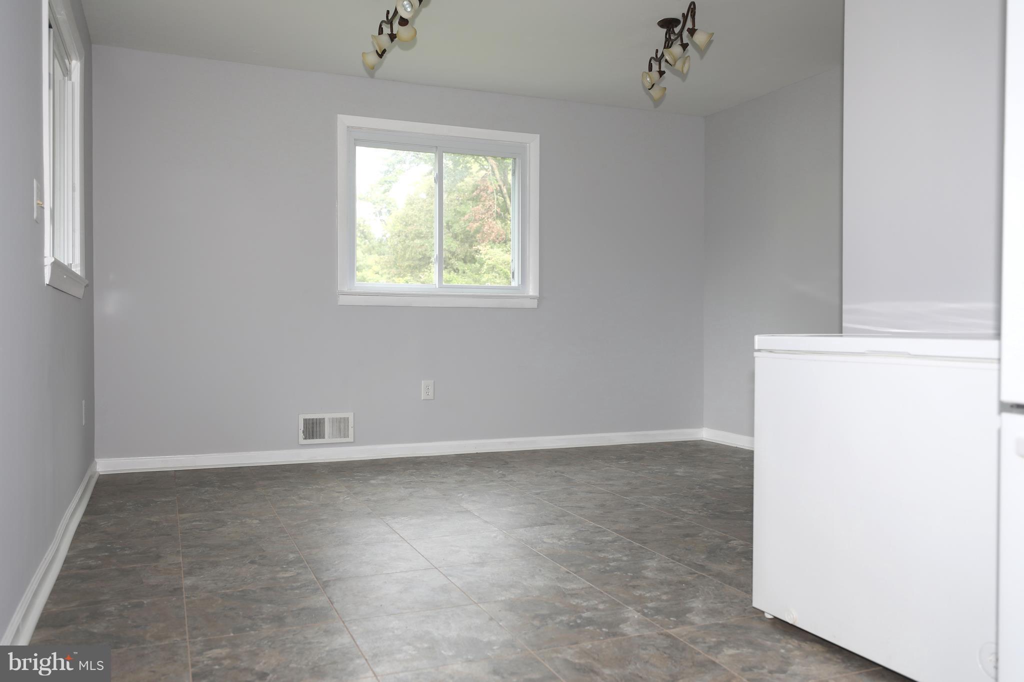 13105 Holdridge Road Silver Spring, MD 20906 - Photo 8 of 18 Tablespace Kitchen with freezer chest
