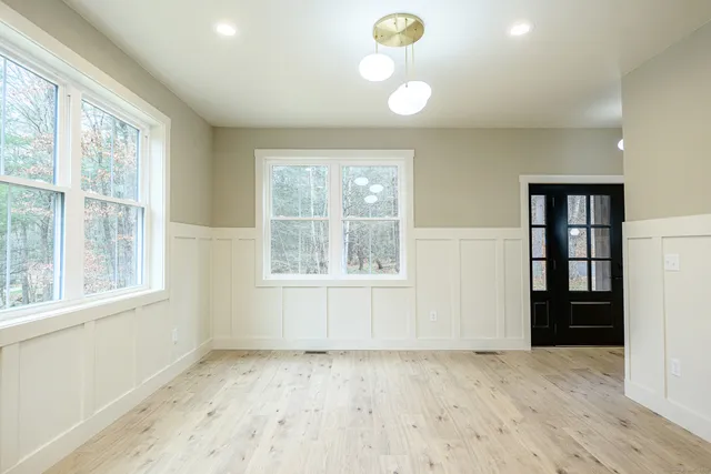 an empty room with windows