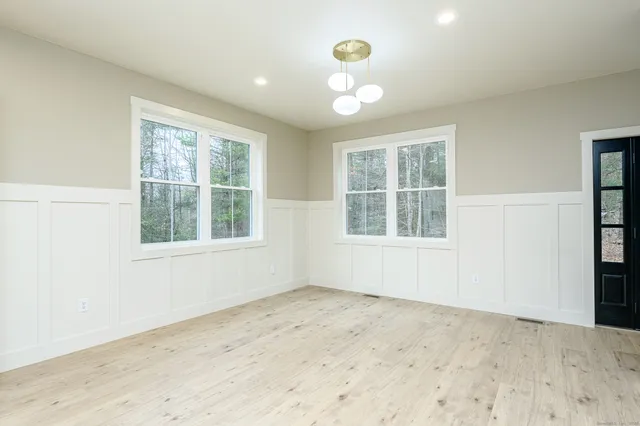 an empty room with windows