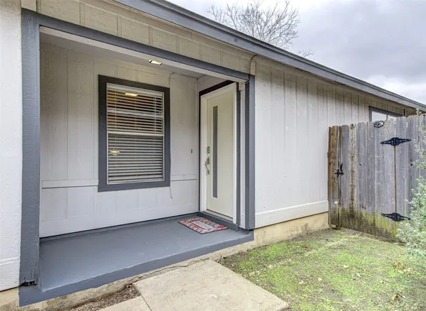a view of backyard with trampoline