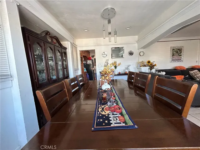 a kitchen with stainless steel appliances granite countertop a sink and a stove