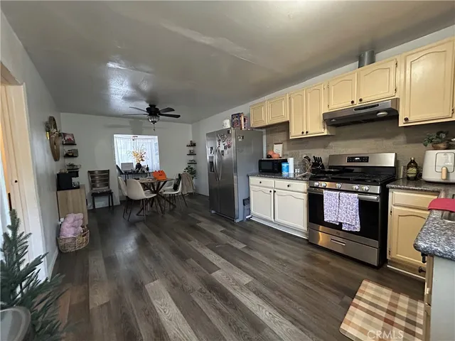 a balcony with table and chairs