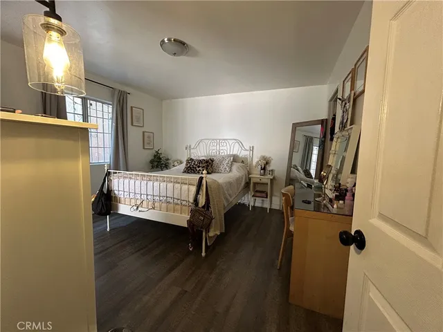 a bathroom with a toilet a sink and a mirror