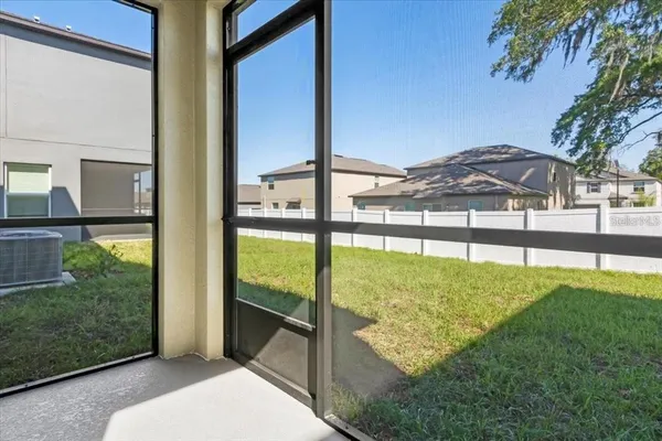 a view of outdoor space and backyard