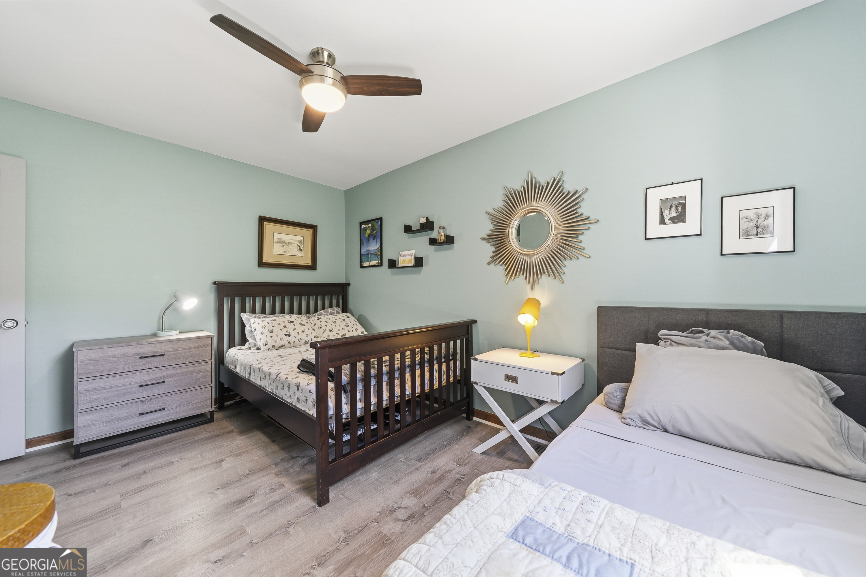 118 Hickory Point Buckhead, GA 30625 - Photo 39 of 69 a bedroom with a bed and a chandelier