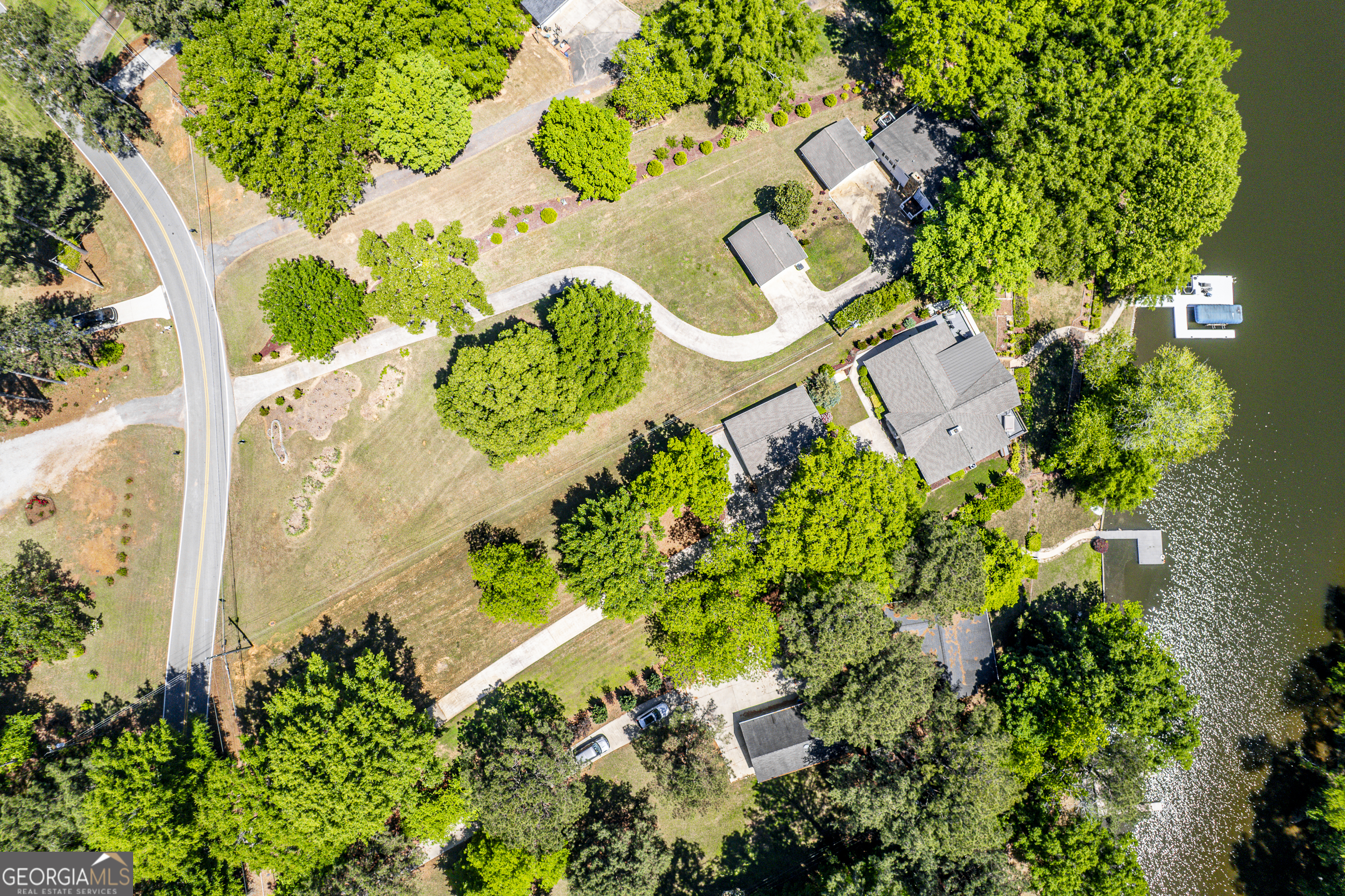 118 Hickory Point Buckhead, GA 30625 - Photo 69 of 69 an aerial view of a house with a yard and garden