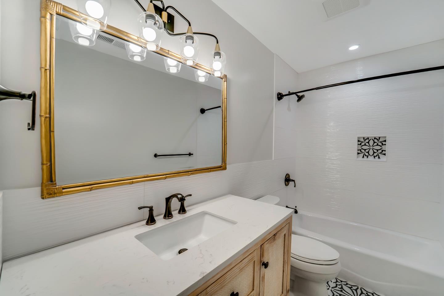 890 Quintinia Drive Sunnyvale, CA 94086 - Photo 17 of 37 a bathroom with a sink vanity granite toilet tub and shower