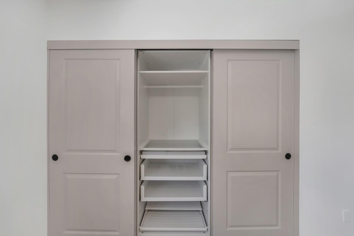 890 Quintinia Drive Sunnyvale, CA 94086 - Photo 25 of 37 a view of walk in closet with empty racks