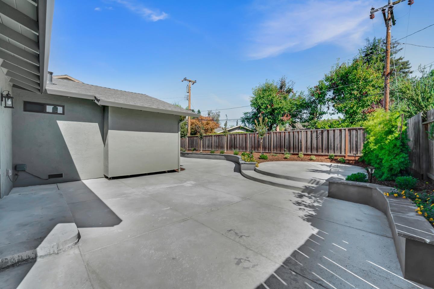 890 Quintinia Drive Sunnyvale, CA 94086 - Photo 29 of 37 a view of a chair and table in the backyard