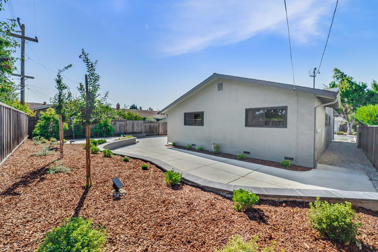 890 Quintinia Drive Sunnyvale, CA 94086 - Photo 33 of 37 a house view with a backyard space