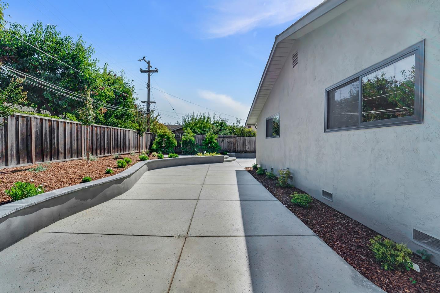 890 Quintinia Drive Sunnyvale, CA 94086 - Photo 34 of 37 a view of balcony with wooden floor and fence
