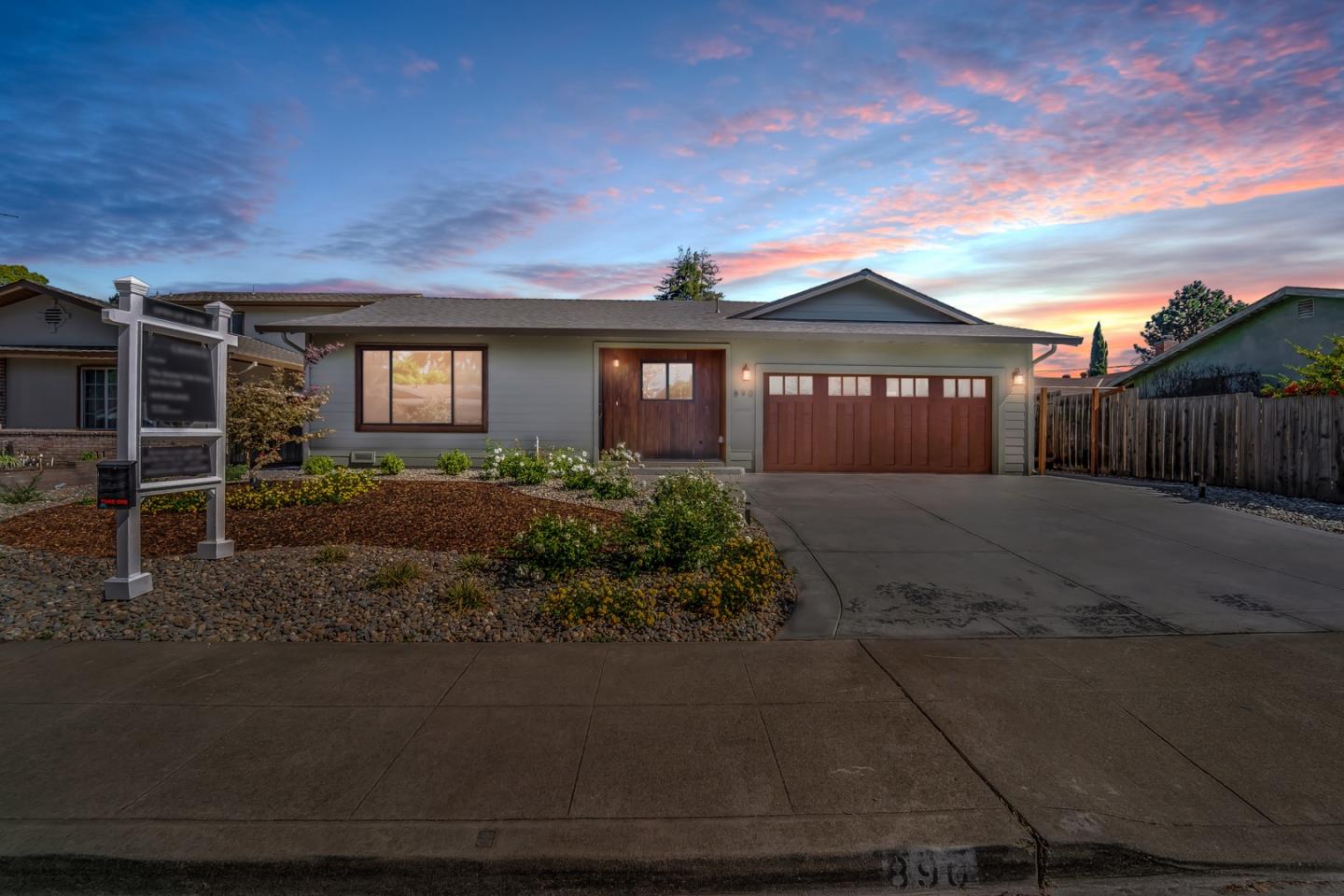 890 Quintinia Drive Sunnyvale, CA 94086 - Photo 37 of 37 a front view of a house with a yard