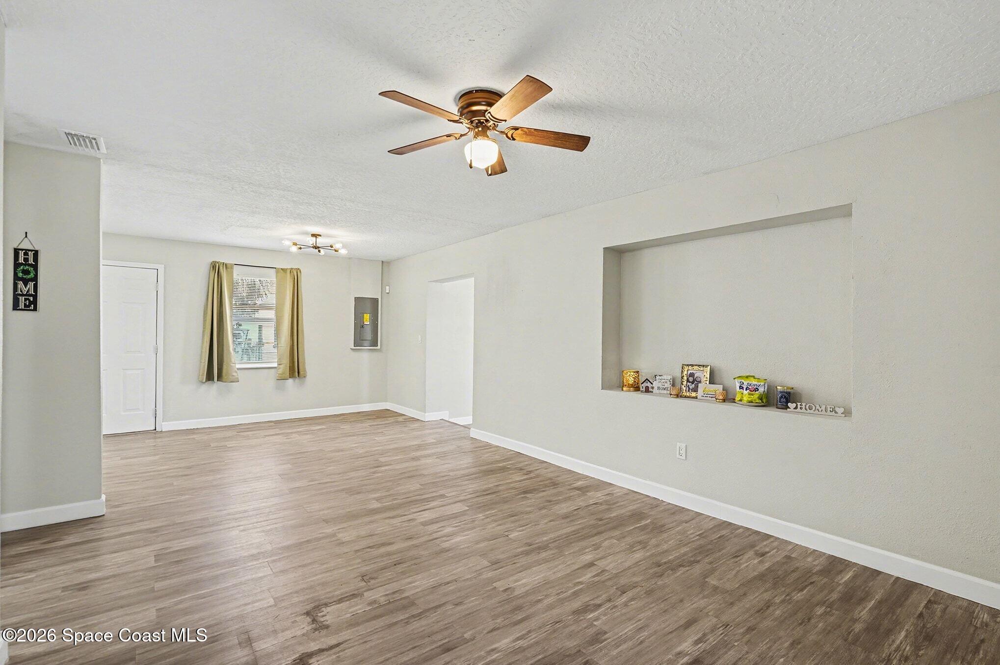 905 Poplar Lane Melbourne, FL 32901 - Photo 29 of 30 Living into Dining