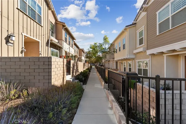 a narrow alley leading to a building