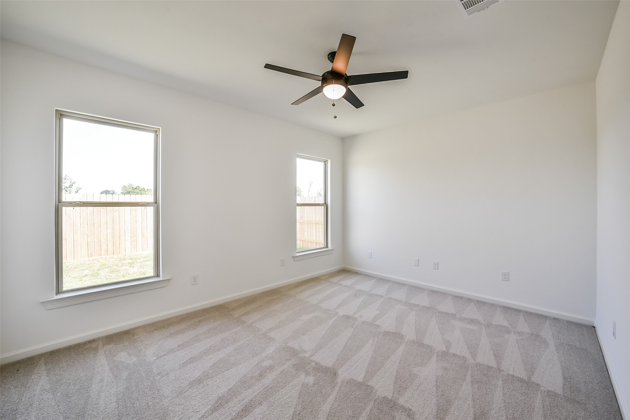 40708 Pessi Road Magnolia, TX 77354 - Photo 15 of 30 a view of empty room with windows