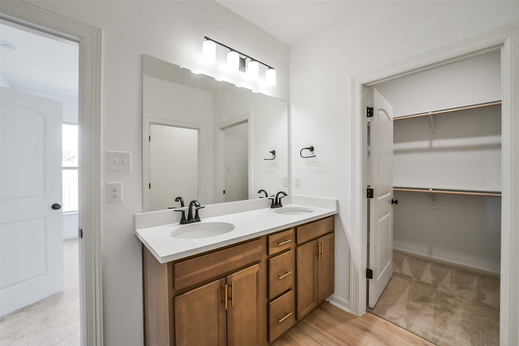 40708 Pessi Road Magnolia, TX 77354 - Photo 17 of 30 a bathroom with a sink and a mirror