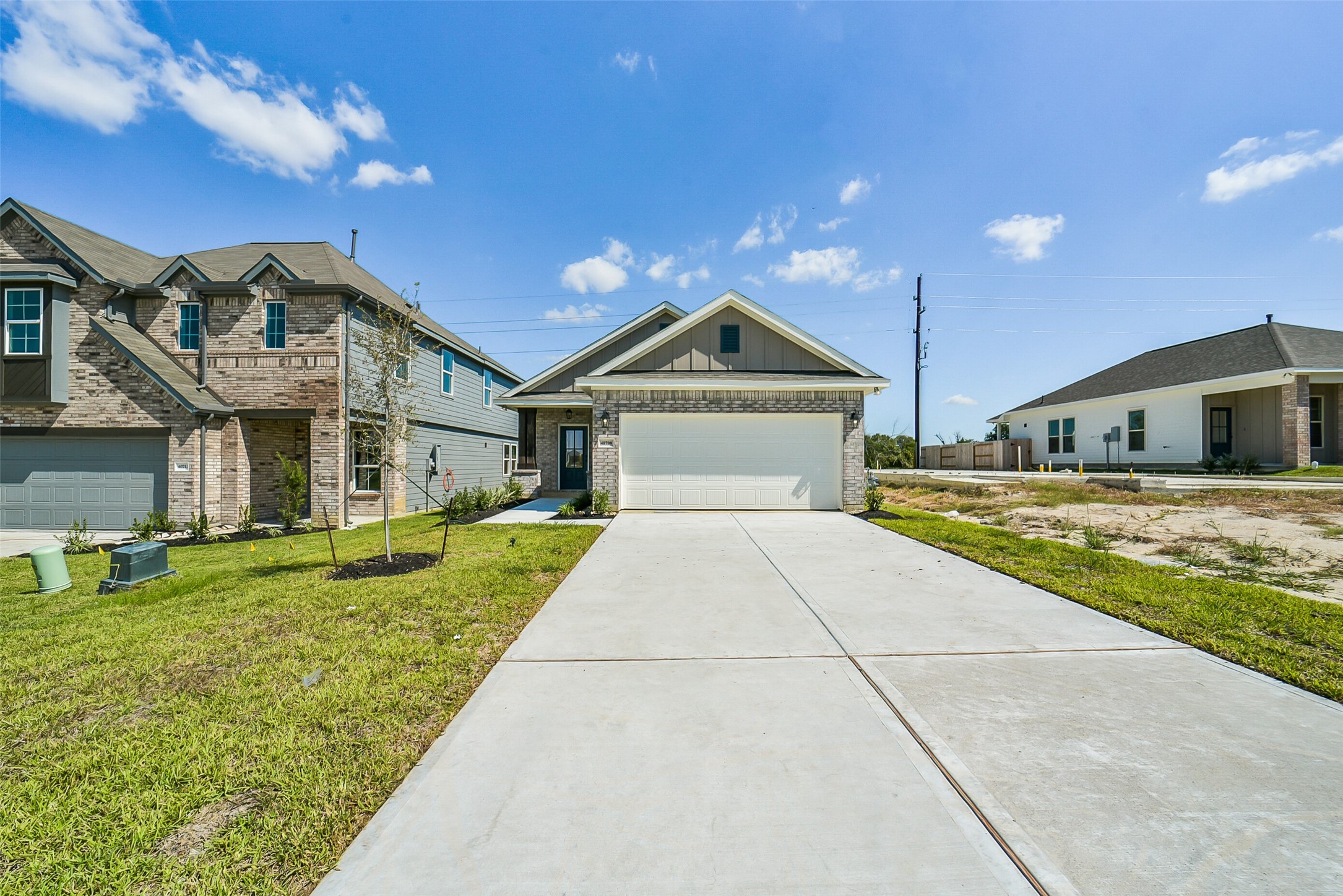 40708 Pessi Road Magnolia, TX 77354 - Photo 2 of 30 a front view of a house with a yard