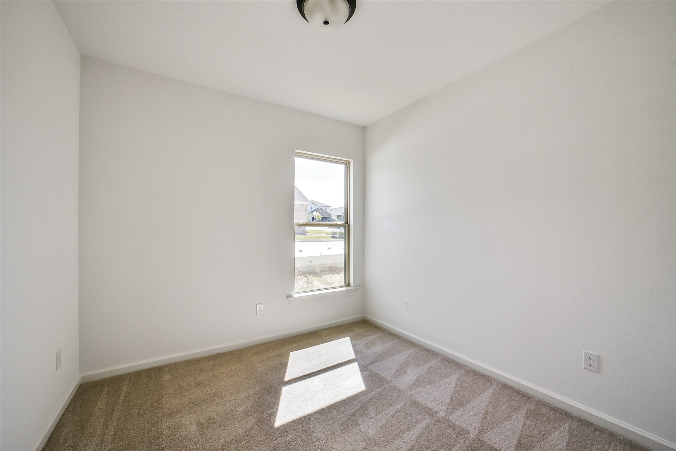 40708 Pessi Road Magnolia, TX 77354 - Photo 23 of 30 an empty room with windows