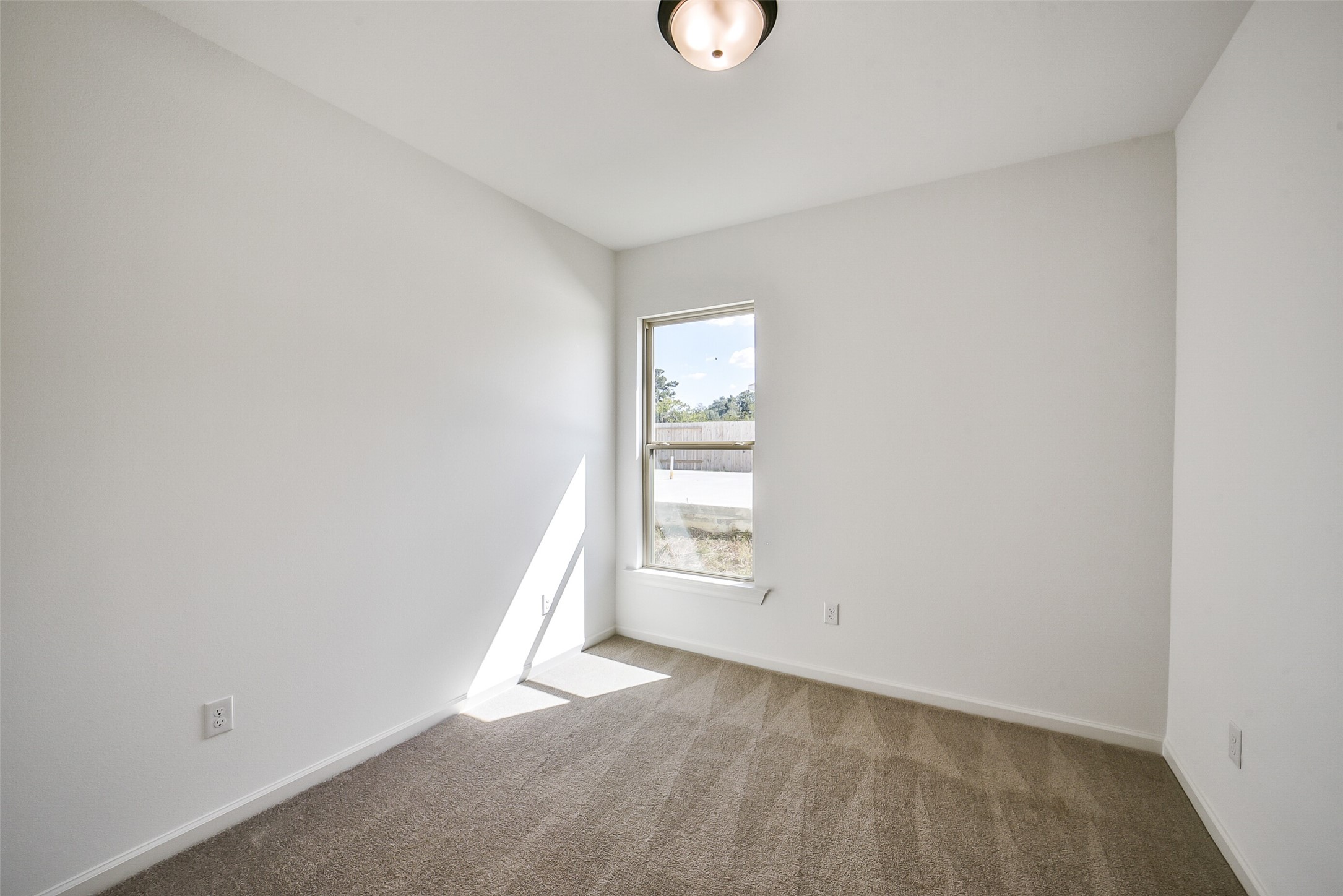 40708 Pessi Road Magnolia, TX 77354 - Photo 26 of 30 an empty room with windows