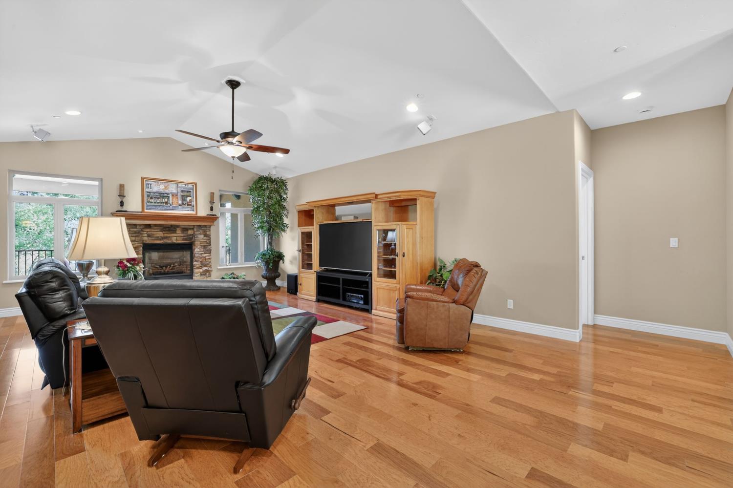 4554 Cross Creek Road Cool, CA 95614 - Photo 15 of 92 a living room with furniture and a fireplace