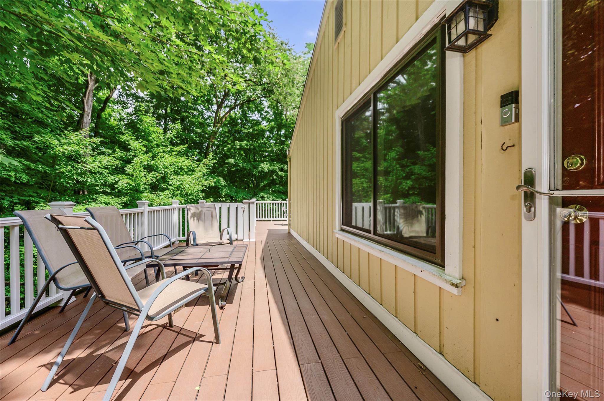 231 Increase Miller Road Katonah, NY 10536 - Photo 22 of 34 Side balcony with kitchen access.
