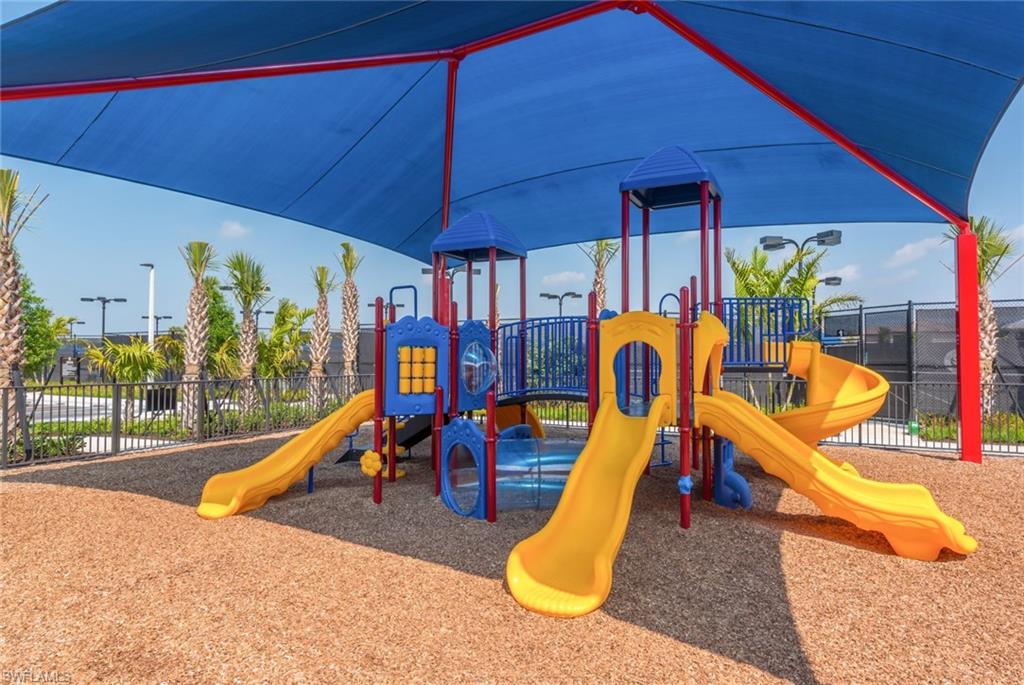4609 Azalea Drive Naples, FL 34119 - Photo 43 of 45 a view of a park with a slide