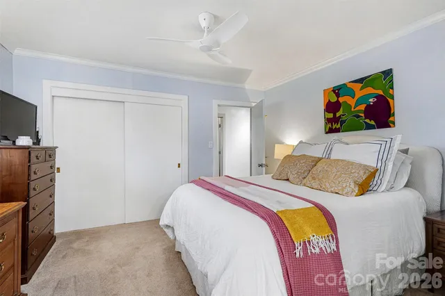 a bedroom with a bed and furniture