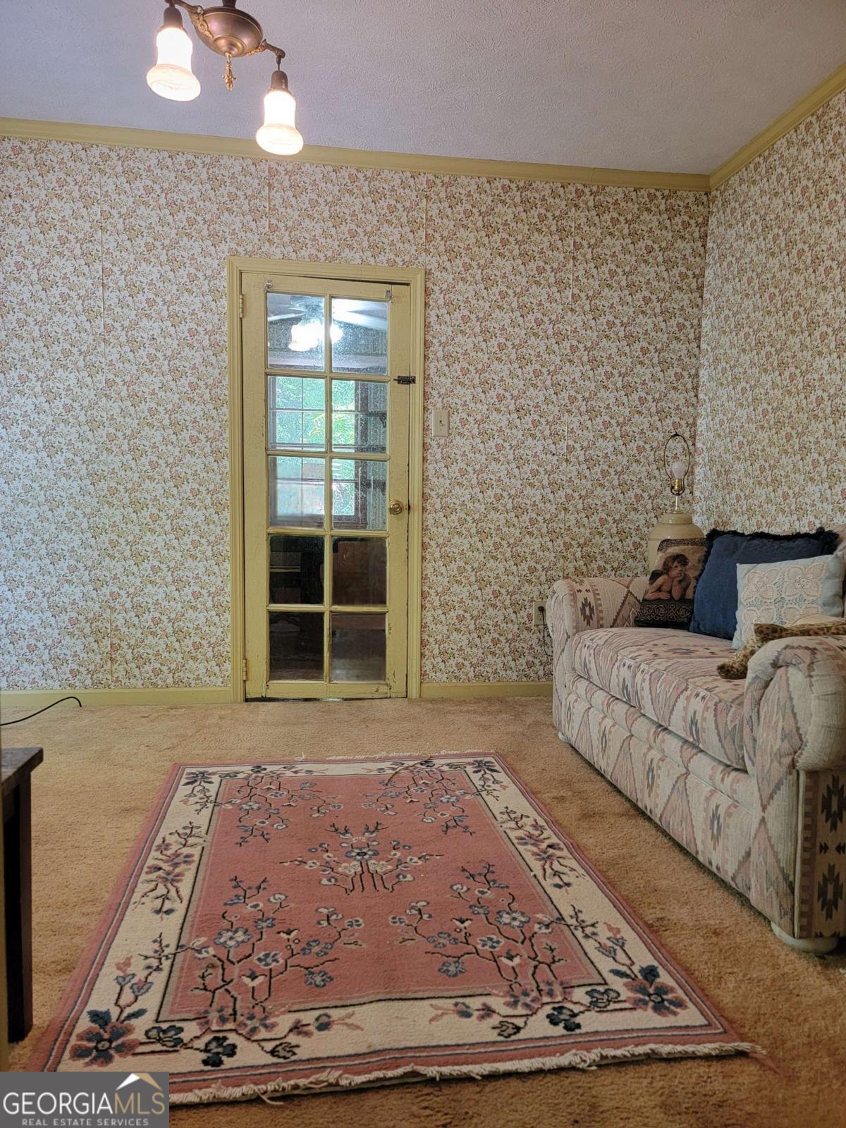 346 South Oliver Street Elberton, GA 30635 - Photo 30 of 52 a large bed sitting in a bedroom next to a window