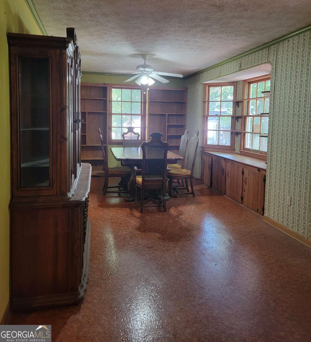 346 South Oliver Street Elberton, GA 30635 - Photo 32 of 52 a living room with furniture window and wooden floor