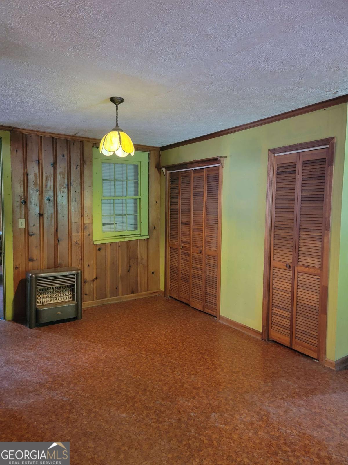 346 South Oliver Street Elberton, GA 30635 - Photo 38 of 52 an empty room with a window and a dresser