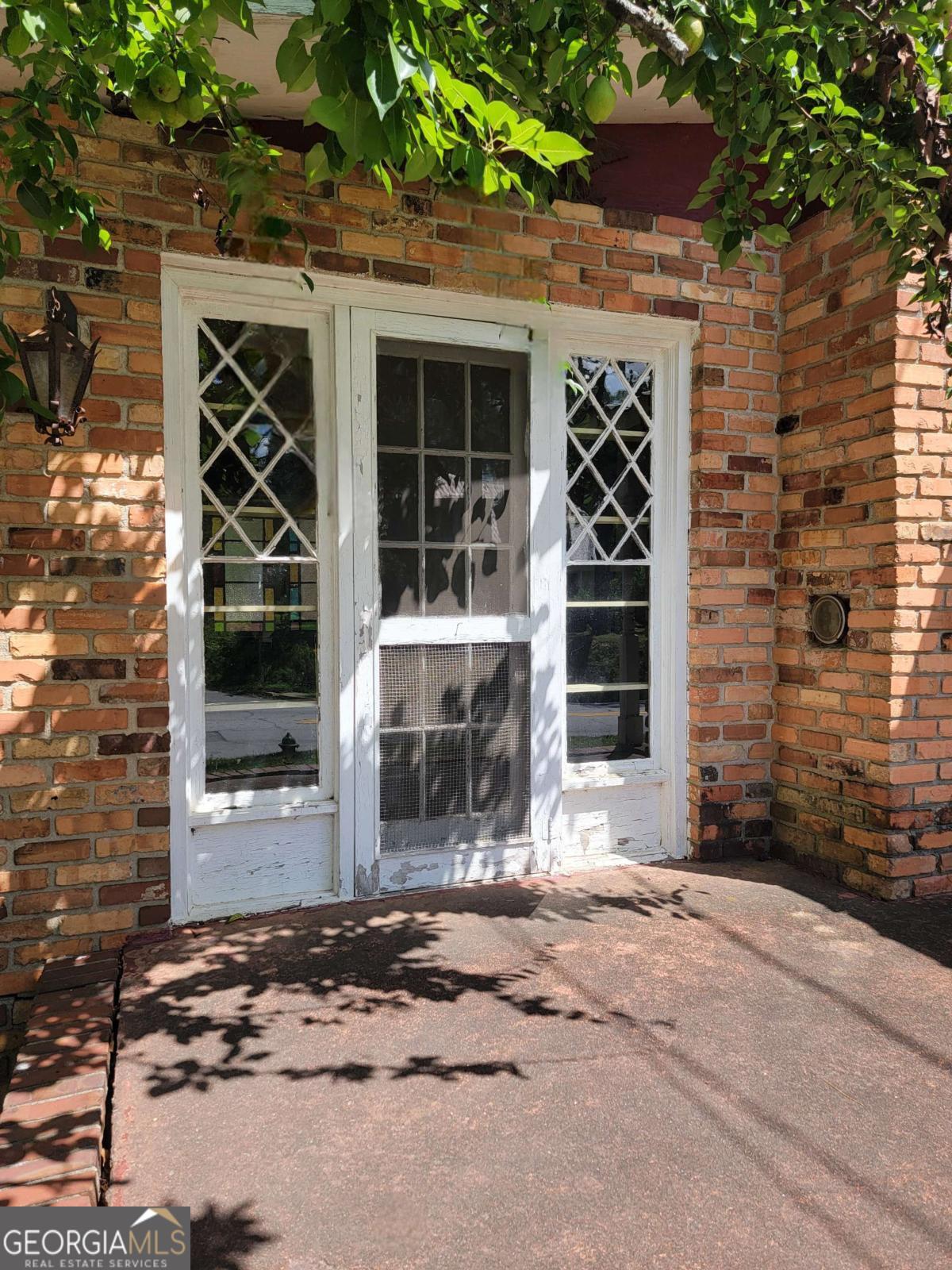 346 South Oliver Street Elberton, GA 30635 - Photo 4 of 52 a front view of a house with a yard and garage