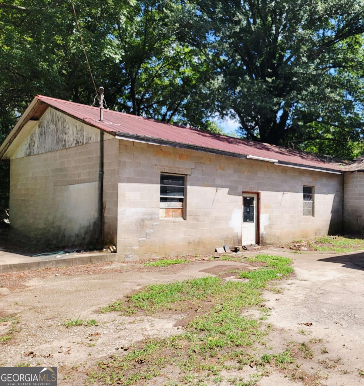 346 South Oliver Street Elberton, GA 30635 - Photo 49 of 52 a house with trees in front of it