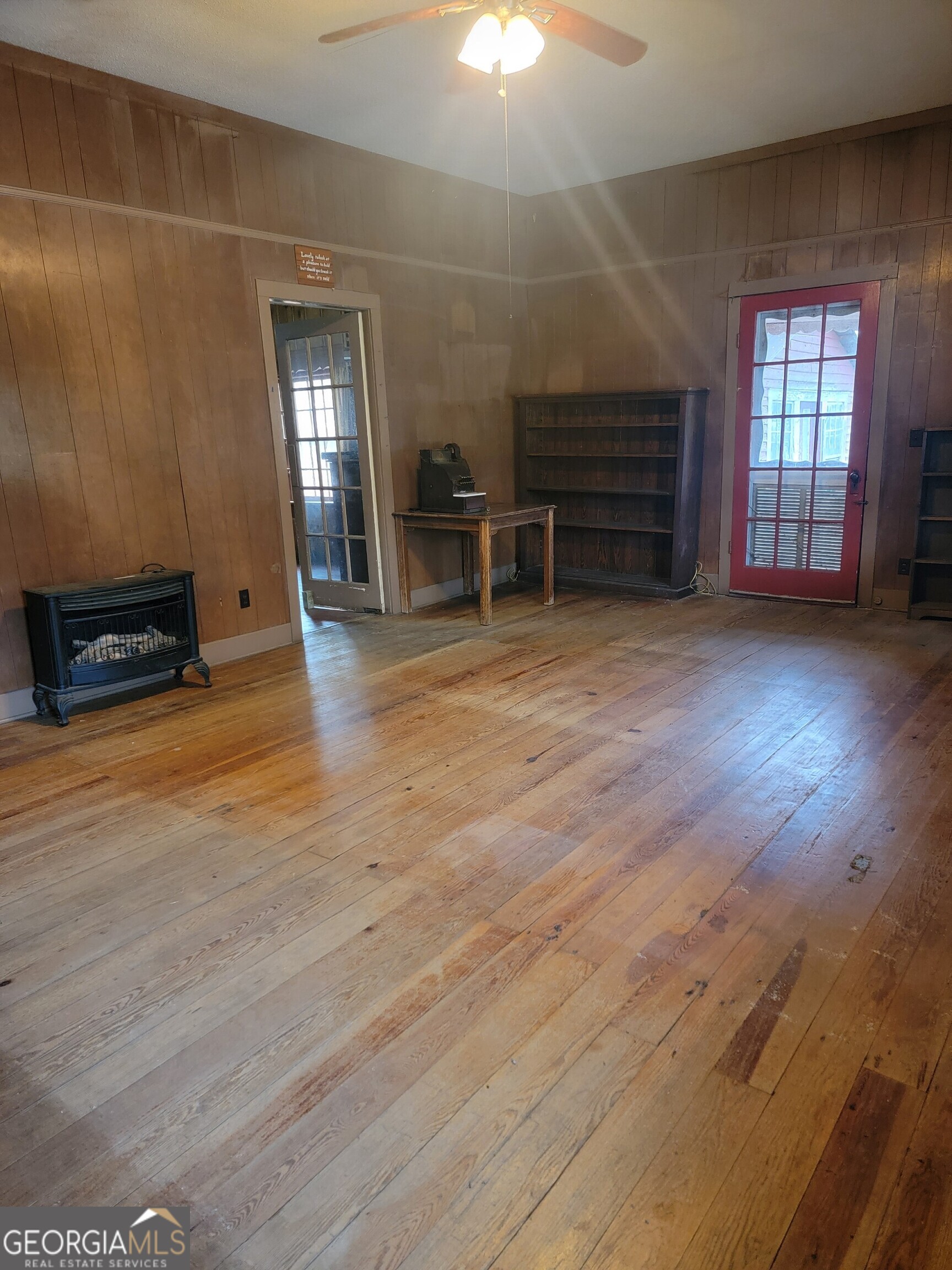 346 South Oliver Street Elberton, GA 30635 - Photo 6 of 52 wooden floor in an empty room with a window