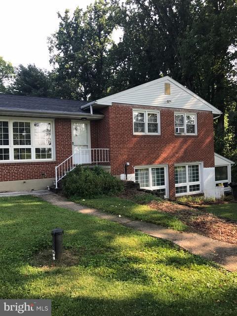 3917 Miller Road Kingsville, MD 21087 - Photo 1 of 1 a front view of a house with a yard