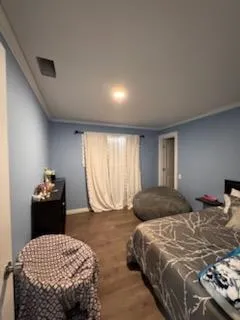 a bathroom with a sink a toilet and shower curtain