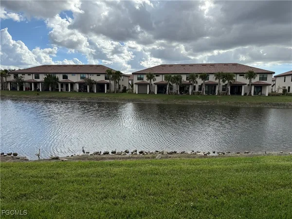 a view of a lake with houses