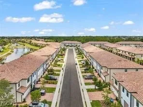 a view of a lake with a building in the background
